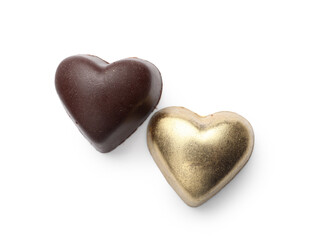 Tasty heart-shaped candies on white background