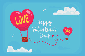 Two balloons are connected by a thread to form a heart. St. Valentine's Day