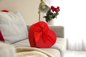 Gift for Valentine's Day on couch in room