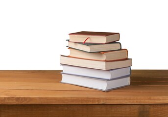 Vintage old stack books on a wooden deck