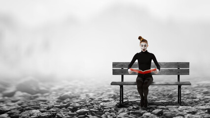 Female mime with book . Mixed media