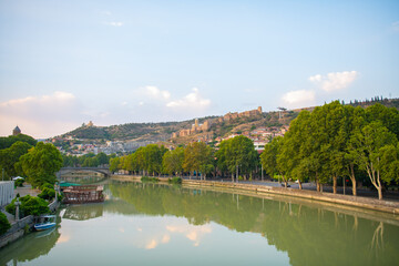 wide river kura and pier with boats