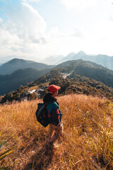 Obraz premium Hiking in mountains in the evening