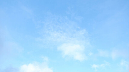 Naklejka na ściany i meble Sky with bright white clouds
