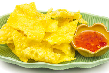 dumpling fried with sauce on white plate, Thai food in thailand isolated over white background.