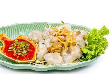 Fish dumpling with sauce on white plate, Thai food in thailand isolated over white background.