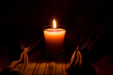 candles that are lit in the dark