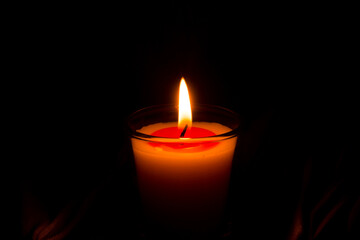 candles that are lit in the dark