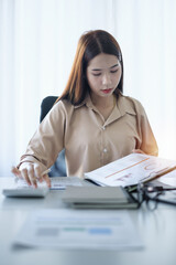 Fototapeta na wymiar Business woman analyst financial advisor preparing statistical report searching documents on work desk, browsing information