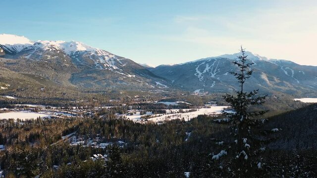 snow covered ski resort at sunset