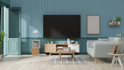 Interior mock up living room with armchair ,TV on cabinet in modern living room with lamp,table,flower and plant on wooden wall background,3d rendering