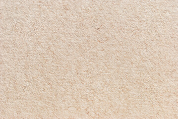 Cardboard texture, a sheet of light recycled craft paper texture as background