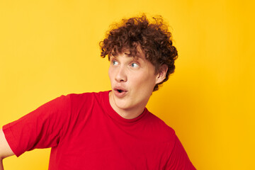Fototapeta na wymiar portrait of a young curly man summer style fashion posing isolated background unaltered