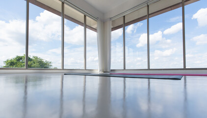 Fototapeta na wymiar Empty yoga studio and city view sky scenery, trees