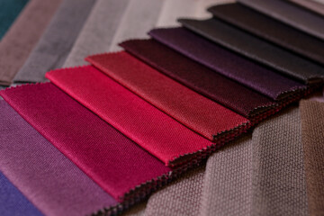 Samples of furniture fabrics.Multicolor fabric texture background.