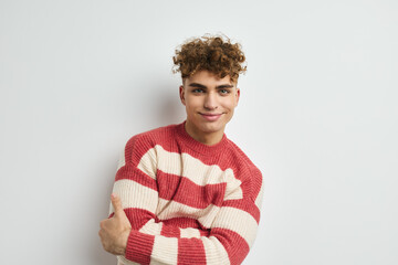 kinky guy in a striped sweater posing Lifestyle unaltered