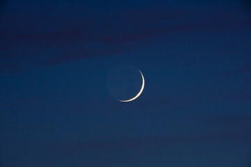 Young crescent Moon with 7% phase.
