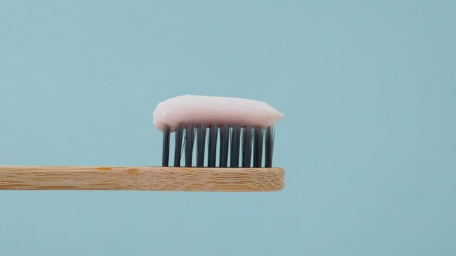 Organic bamboo charcoal toothbrush with toothpaste. eco friendly biodegradable personal care products. Plastic free lifestyle