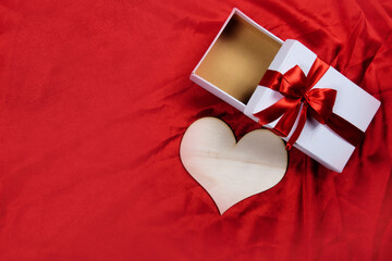 Heart and gift box with a colored background