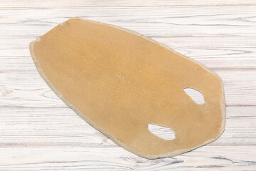 natural colored beige rays leather on the wooden table