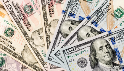 Money US dollars banknotes, a lot of different money. Bitcoin exchange for dollar inflation. Worldwide cryptocurrency and digital payment system. Availability