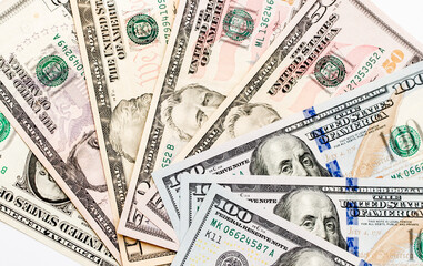 Money US dollars banknotes, a lot of different money. Bitcoin exchange for dollar inflation. Worldwide cryptocurrency and digital payment system. Availability