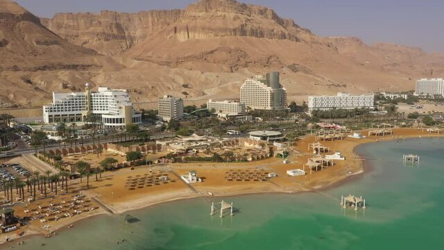 Aerial view of hotels on Ein Bokek beach, a popular resort town on the Dead Sea. Recreation and natural beauty in Israel.
