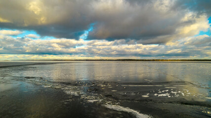 Aerial view of seagulls on a frozen lake