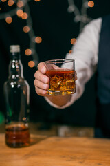 Barman pouring whiskey whiskey glass beautiful night
