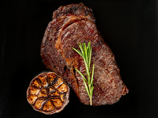 Barbecue meat steak grill served on black background plate, macro overlay, flat lay, top view - 481114709