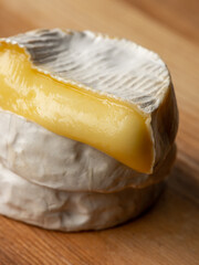 Tasty melted cheese camembert on wooden table close up, selective focus - 481114741