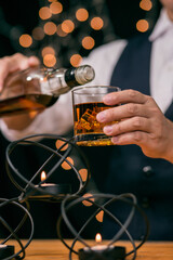 Barman pouring whiskey whiskey glass beautiful night