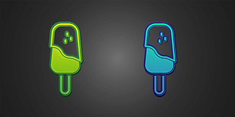 Green and blue Ice cream icon isolated on black background. Sweet symbol. Vector