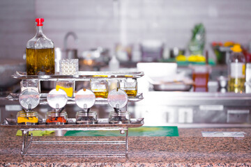 Kitchen, cooking dinner. Sauces for cooking on the kitchen table. Cooks recipes. Kitchen background with copy space for text. cuisine