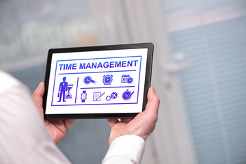 Time management concept on a tablet