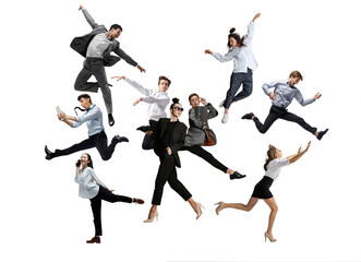Male and female office workers jumping and dancing in casual and business style clothes with...