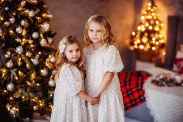 children, new year, new year's interior, christmas tree, photo shoot in the studio, family, sisters