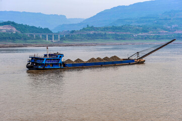 Fototapeta premium Various Ships Transporting along the Yangtze River in China
