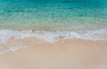 Fototapeta na wymiar Beautiful nature of white sandy beach and ocean in tropical island.