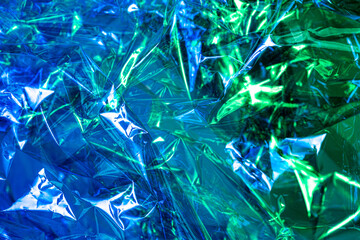 Blue and green, modern, chaotic and shiny background.