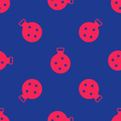 Red Bottle with potion icon isolated seamless pattern on blue background. Flask with magic potion. Happy Halloween party. Vector