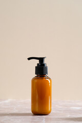 Cosmetic dispenser bottle with soap gel for personal hygiene. Beauty product packaging design, branding.