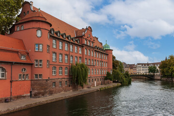 Fototapeta premium The Ill river embankment in Strasbourg. Alsace, France