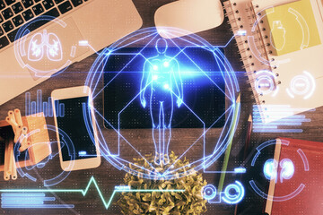 Double exposure of education theme drawing over table with phone. Top view. Science education concept.