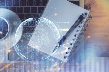 Double exposure of map sketch and table top veiw. Concept of international data.