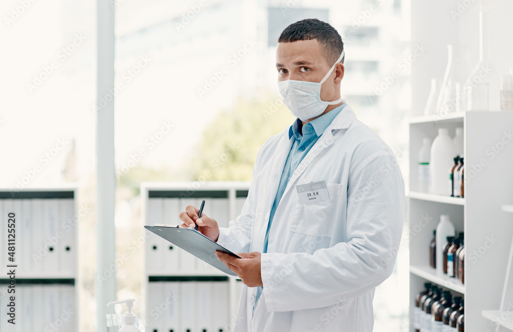 Poster the countdown to a covid-19 breakthrough. portrait of a young scientist writing notes on a clipboard