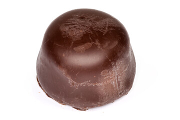 Chocolate truffle on a white background close-up