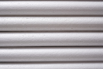 Obraz premium Abstract background of white foam cylinders