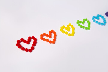 Hearts of rainbow color from fluffy circles. Background for holiday valentine's day. LGBT concept. Movement for equal rights