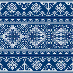 Zmijanski vez retro vector folk art seamless pattern - styled as cross-stitch design from Bosnia and Herezegovina in white on navy bvlue
